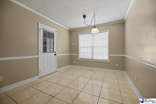 838 Greenwing Teal, Florence, SC 29505 - unfurnished dining area with a textured ceiling, crown molding, baseboards, and tile patterned floors