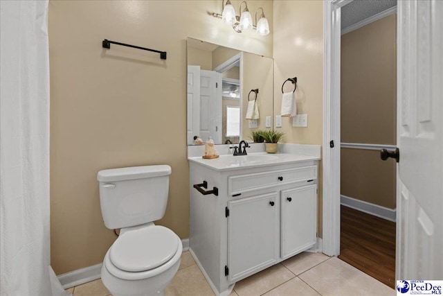 838 Greenwing Teal, Florence, SC 29505 - full bathroom with toilet, tile patterned floors, vanity, and baseboards