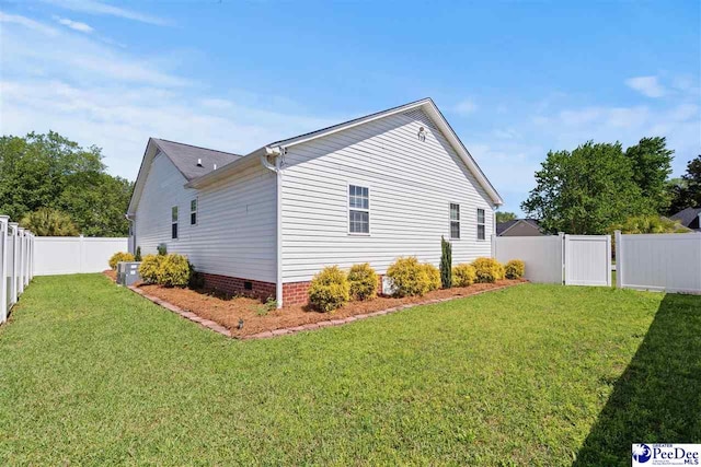 838 Greenwing Teal, Florence, SC 29505 - view of side of home featuring a fenced backyard, a lawn, and crawl space