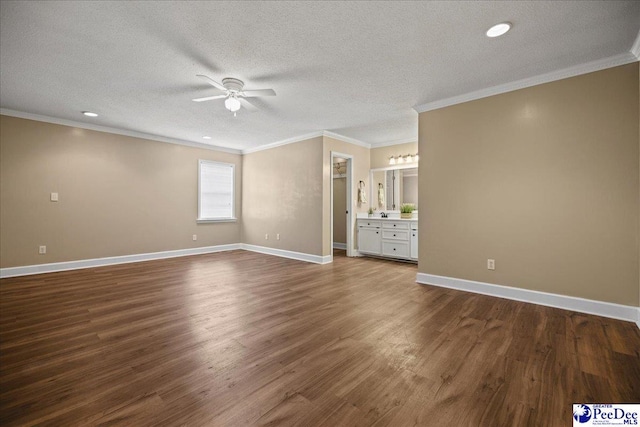 838 Greenwing Teal, Florence, SC 29505 - empty room featuring dark wood-style flooring, a textured ceiling, ornamental molding, and ceiling fan