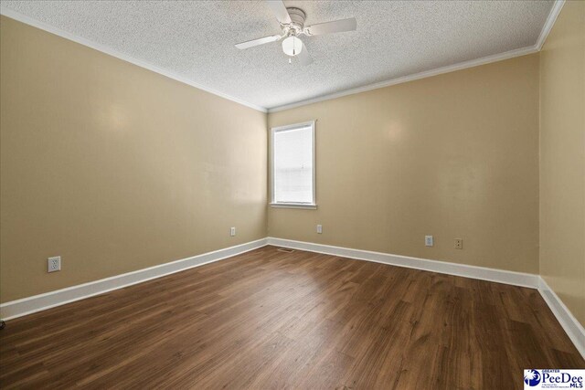 838 Greenwing Teal, Florence, SC 29505 - unfurnished room with dark wood-style floors, a textured ceiling, crown molding, and ceiling fan