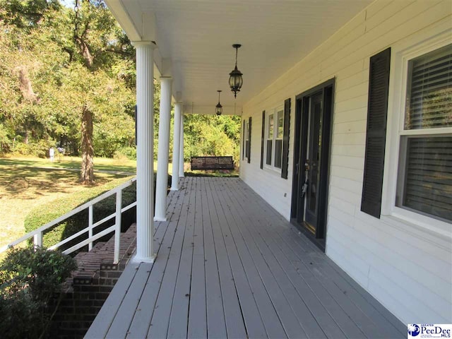 deck with covered porch