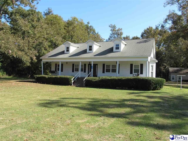 view of front facade featuring a porch and a front yard