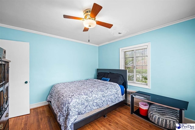 600 Greenway Dr, Florence, SC 29501 - bedroom featuring wood finished floors, baseboards, and ornamental molding