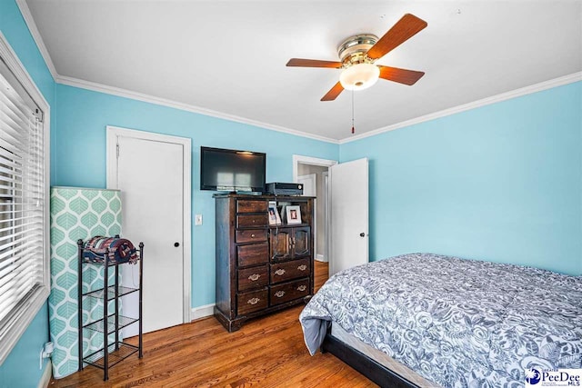 600 Greenway Dr, Florence, SC 29501 - bedroom featuring ornamental molding, ceiling fan, and wood finished floors