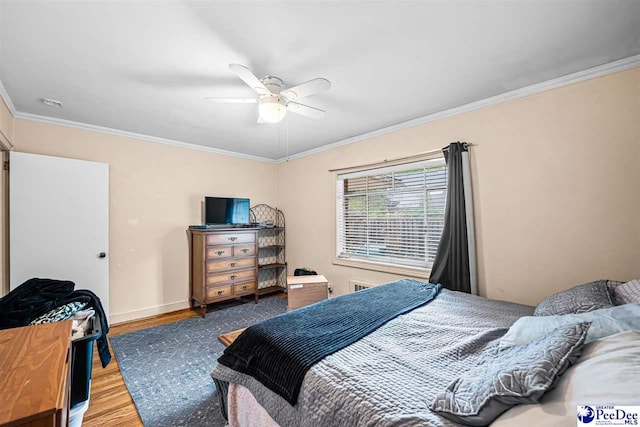 600 Greenway Dr, Florence, SC 29501 - bedroom with ceiling fan, baseboards, wood finished floors, and crown molding