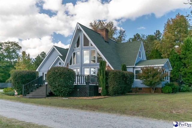 exterior space featuring a front lawn