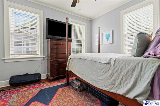 318 Mcleod St, Florence, SC 29501 - bedroom with wood finished floors, crown molding, and ceiling fan