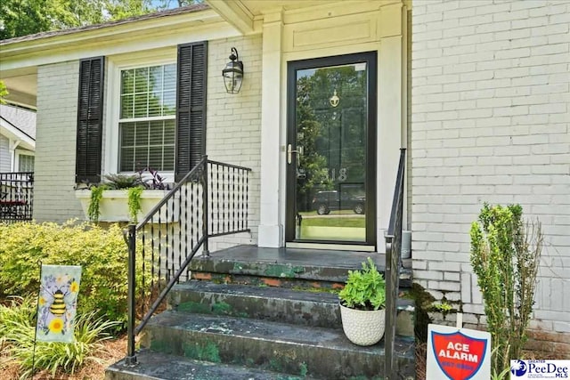 318 Mcleod St, Florence, SC 29501 - property entrance with brick siding and a porch