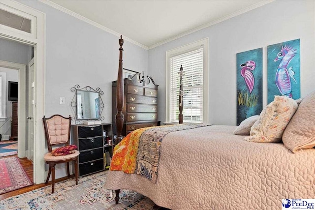 318 Mcleod St, Florence, SC 29501 - bedroom with ornamental molding and wood finished floors