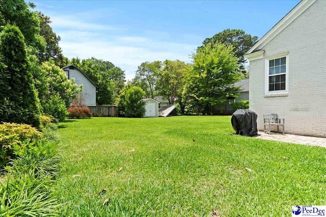 318 Mcleod St, Florence, SC 29501 - view of yard with a storage shed