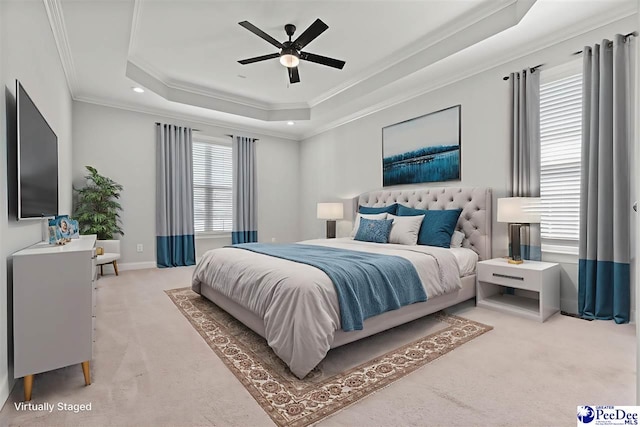 716 Lindsey Dr, Florence, SC 29501 - carpeted bedroom featuring ornamental molding, a tray ceiling, ceiling fan, recessed lighting, and baseboards
