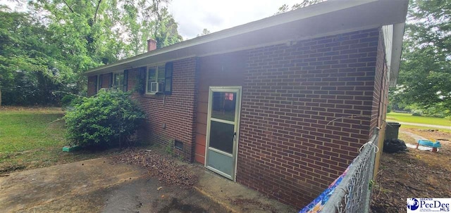 1212 Tator House Rd, Bennettsville, SC 29512 - view of property exterior with crawl space, brick siding, and a chimney