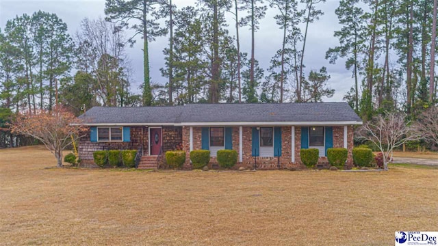 ranch-style house with a front lawn