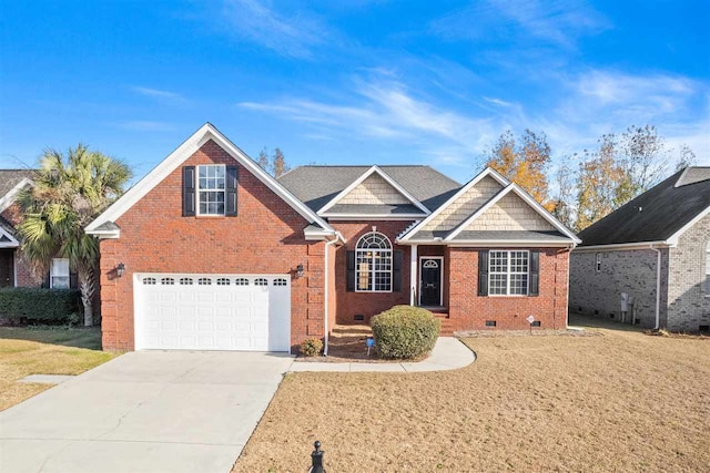 view of front of home featuring a garage and a front yard