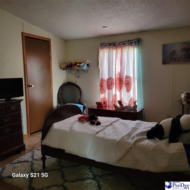 2378 Nichols Ln 2374, 2376, Effingham, SC 29541 - bedroom with a textured ceiling