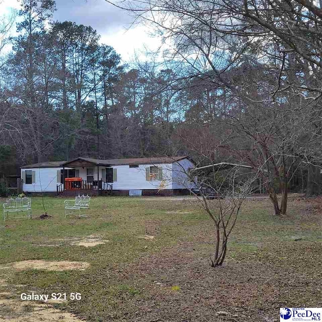 2378 Nichols Ln 2374, 2376, Effingham, SC 29541 - view of front of house featuring a front yard