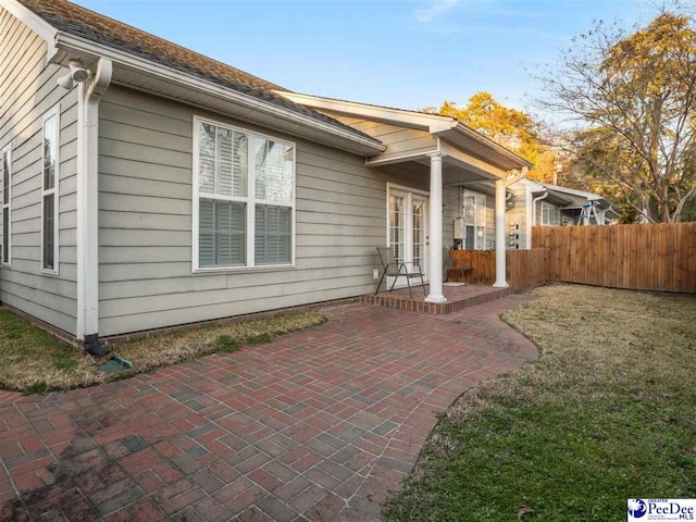 exterior space featuring a patio and a yard