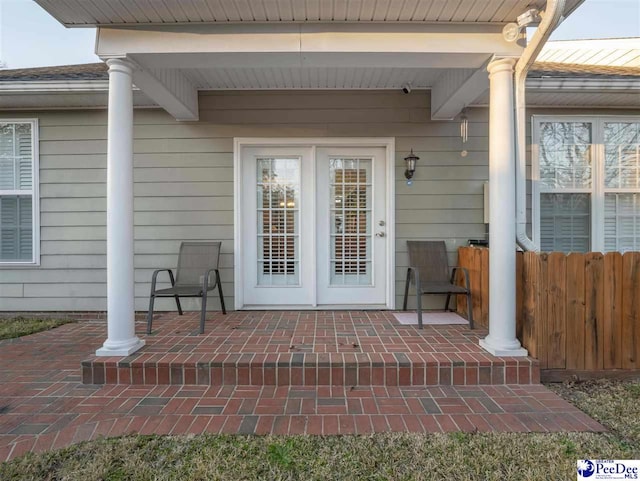 doorway to property with a patio and french doors