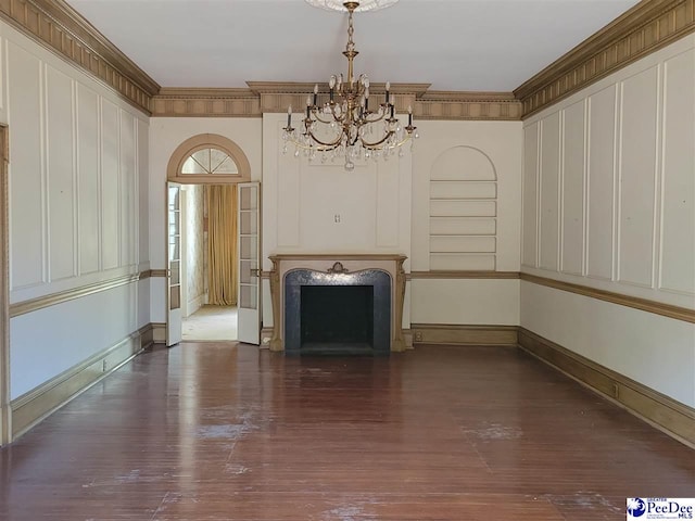601 Cashua St, Darlington, SC 29532 - unfurnished living room with a chandelier, wood-type flooring, a fireplace, baseboards, and crown molding