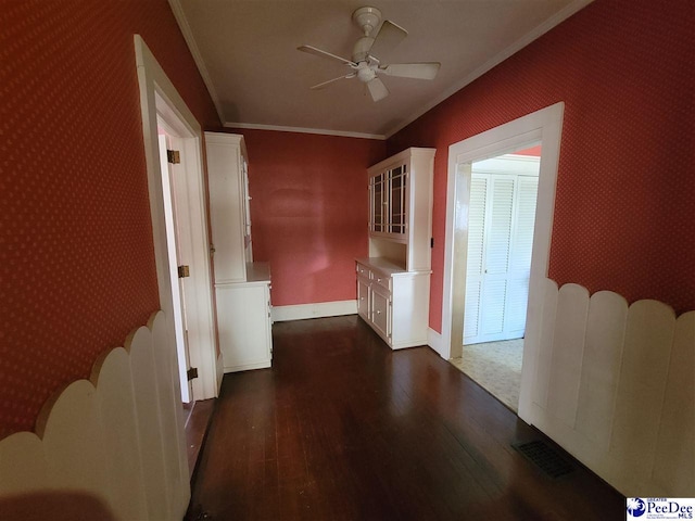 601 Cashua St, Darlington, SC 29532 - hall with dark wood-type flooring, crown molding, baseboards, and wallpapered walls