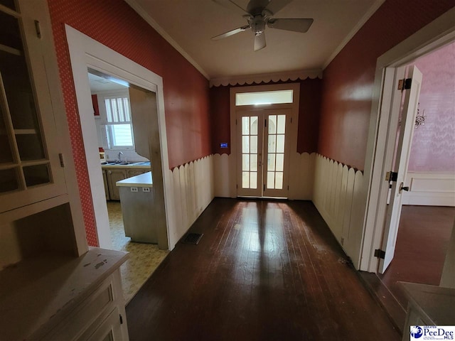 601 Cashua St, Darlington, SC 29532 - doorway to outside featuring a wainscoted wall, ceiling fan, dark wood finished floors, ornamental molding, and french doors