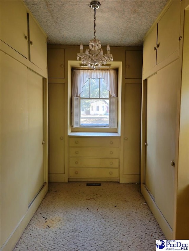 601 Cashua St, Darlington, SC 29532 - unfurnished dining area featuring a chandelier and light colored carpet