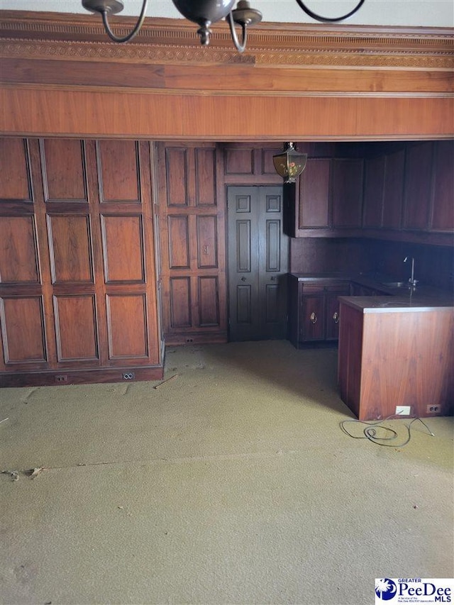 601 Cashua St, Darlington, SC 29532 - kitchen featuring light colored carpet and a sink