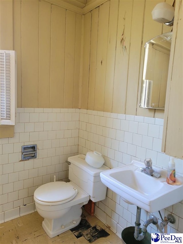 601 Cashua St, Darlington, SC 29532 - bathroom with toilet, tile walls, tasteful backsplash, and a sink