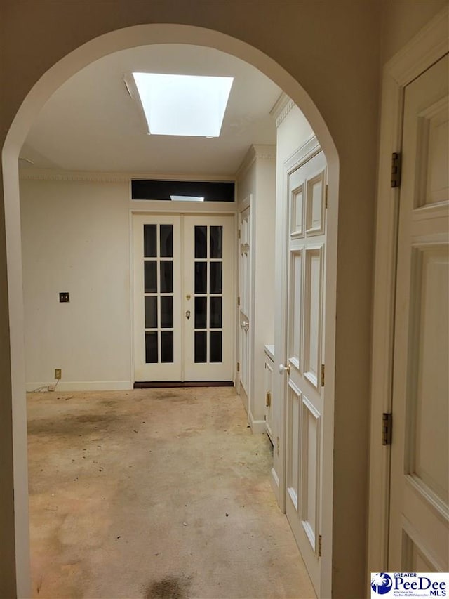601 Cashua St, Darlington, SC 29532 - corridor featuring french doors, unfinished concrete flooring, and a skylight
