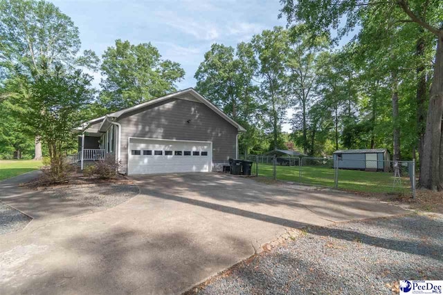 100 Warren Way, Cheraw, SC 29520 - view of side of home with concrete driveway and a garage