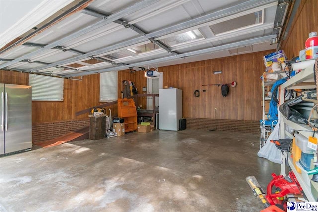 100 Warren Way, Cheraw, SC 29520 - garage with freestanding refrigerator and wooden walls