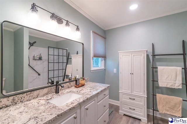 100 Warren Way, Cheraw, SC 29520 - full bath featuring a shower, wood finished floors, vanity, ornamental molding, and baseboards