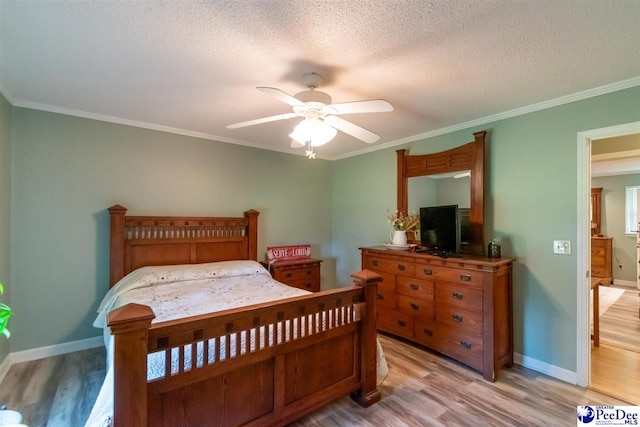 100 Warren Way, Cheraw, SC 29520 - bedroom with light wood-style floors, crown molding, baseboards, a textured ceiling, and ceiling fan