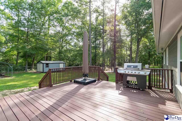 100 Warren Way, Cheraw, SC 29520 - wooden deck featuring view of scattered trees and grilling area