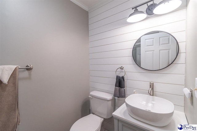 100 Warren Way, Cheraw, SC 29520 - half bath featuring crown molding, wood walls, toilet, and vanity