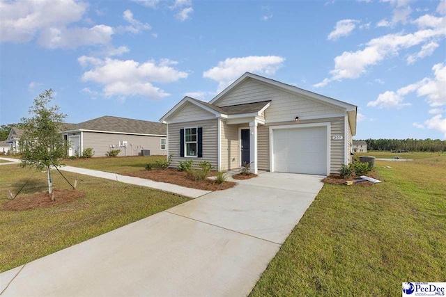 ranch-style house featuring a garage and a front yard