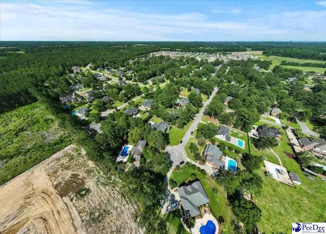 3427 Sussex Ct, Florence, SC 29501 - aerial view of property and surrounding area with a heavily wooded area and nearby suburban area