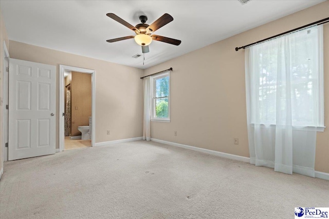 3427 Sussex Ct, Florence, SC 29501 - unfurnished bedroom with carpet flooring, ensuite bath, and ceiling fan