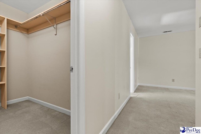 3427 Sussex Ct, Florence, SC 29501 - hallway featuring carpet and baseboards
