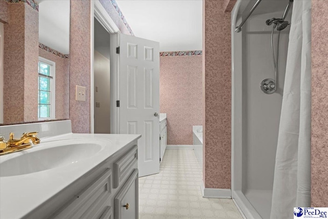 3427 Sussex Ct, Florence, SC 29501 - bathroom with tile patterned floors, vanity, a stall shower, and a garden tub