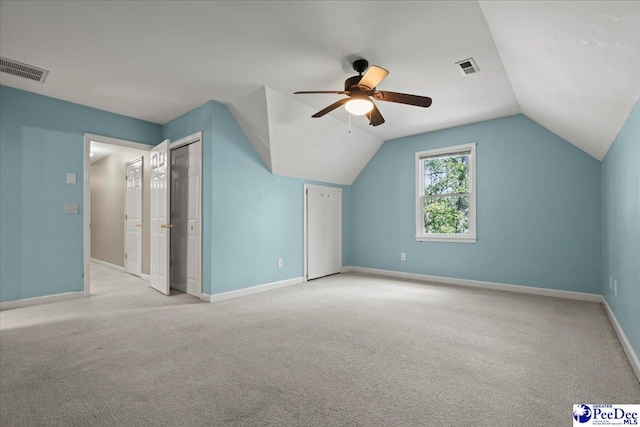 3427 Sussex Ct, Florence, SC 29501 - additional living space featuring light carpet, a ceiling fan, and vaulted ceiling