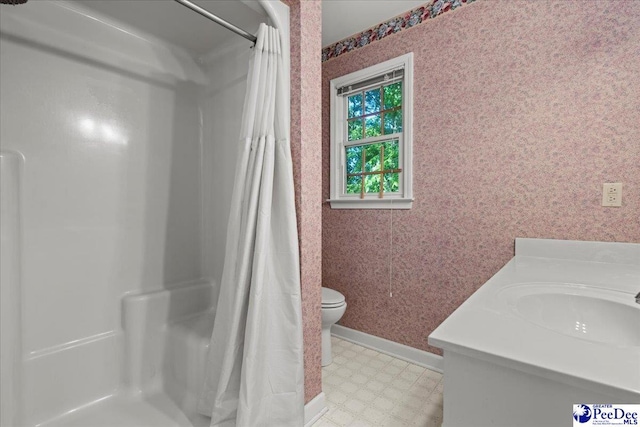3427 Sussex Ct, Florence, SC 29501 - bathroom featuring tile patterned floors, curtained shower, vanity, and wallpapered walls