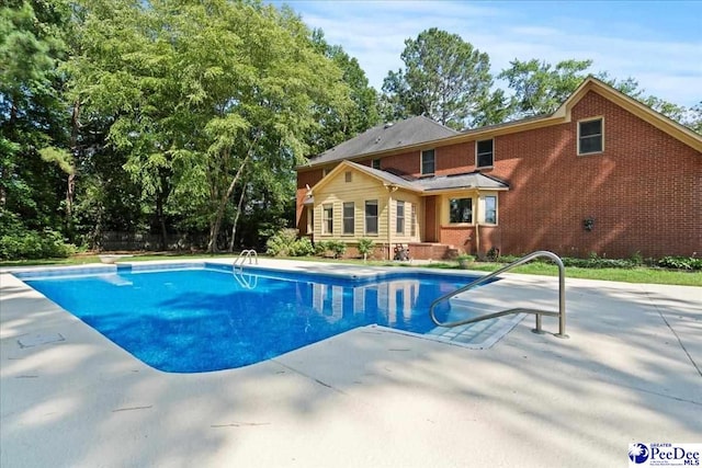3427 Sussex Ct, Florence, SC 29501 - swimming pool with a patio area