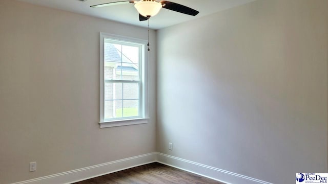 855 Bellemeade Cir, Florence, SC 29501 - unfurnished room with ceiling fan and dark wood-style flooring