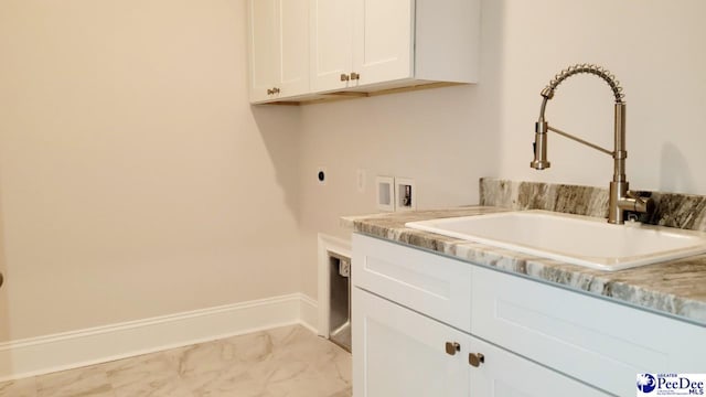 855 Bellemeade Cir, Florence, SC 29501 - laundry area with cabinet space, washer hookup, electric dryer hookup, and light marble finish floors