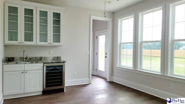 855 Bellemeade Cir, Florence, SC 29501 - indoor wet bar featuring wine cooler, healthy amount of natural light, and dark wood finished floors