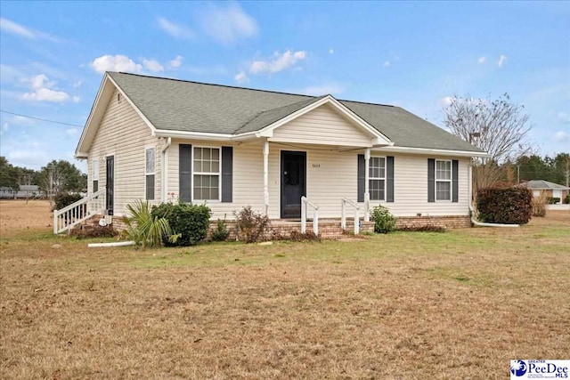 ranch-style house featuring a front lawn