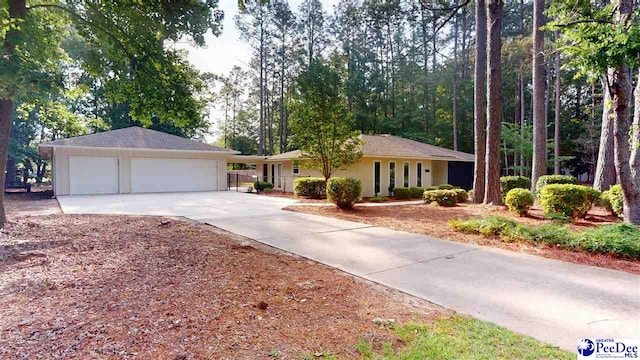 1103 Pine Lake Dr, Hartsville, SC 29550 - ranch-style home with driveway and an attached garage