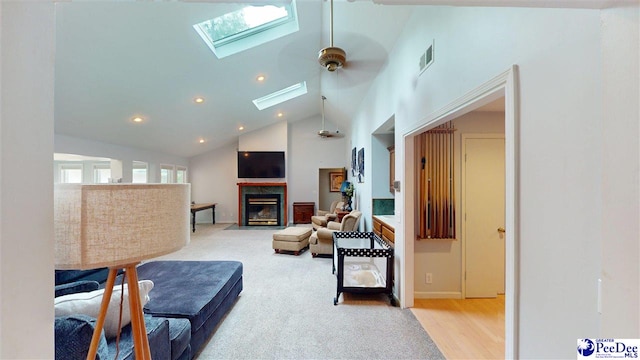 1103 Pine Lake Dr, Hartsville, SC 29550 - living room featuring a skylight, high vaulted ceiling, a high end fireplace, recessed lighting, and ceiling fan
